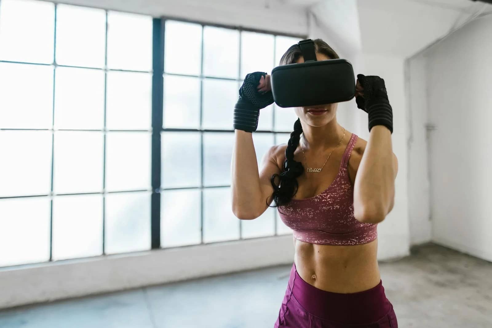 Mobile Gaming Mental Impact-fit woman using virtual reality glasses