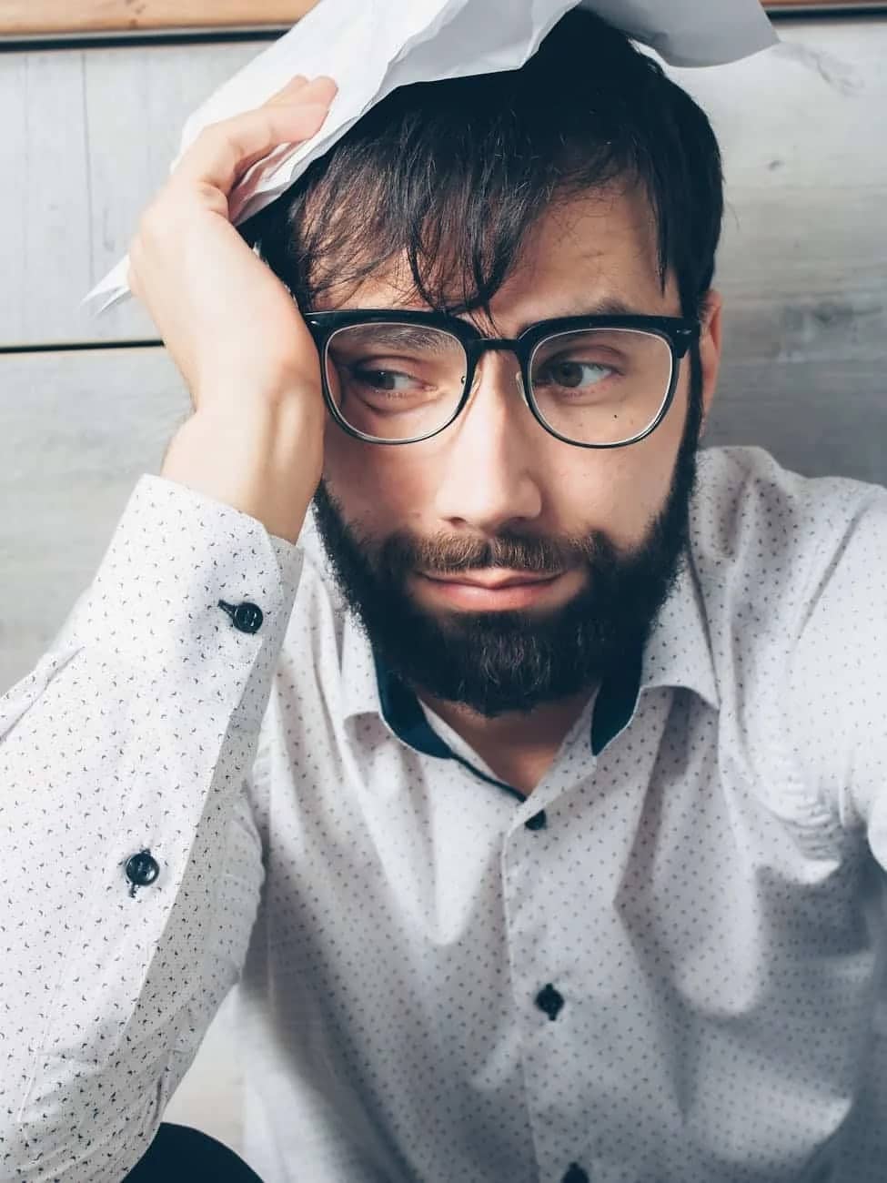 man in white button up shirt wearing black framed eyeglasses: Hair Growth Cycles