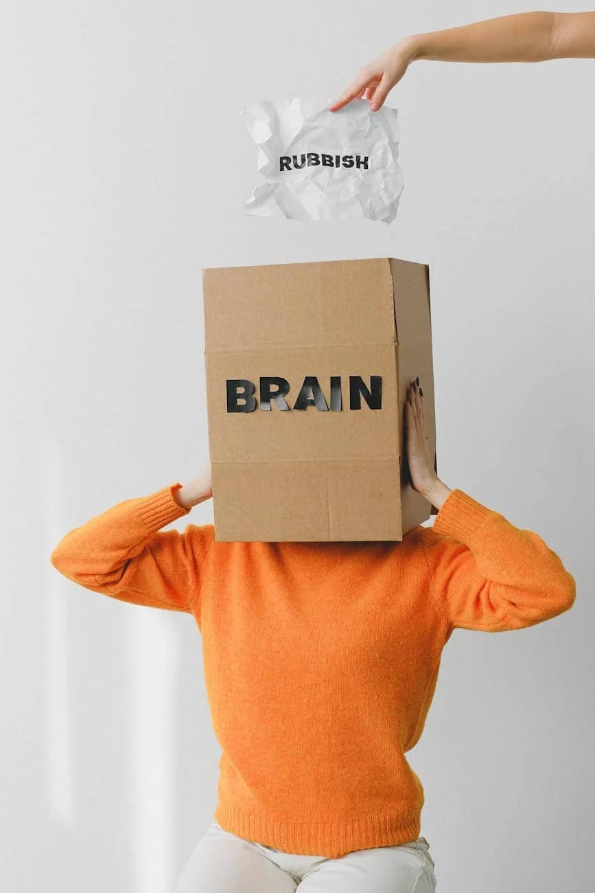 box with brain title on head of unrecognizable woman - Menopause symptoms